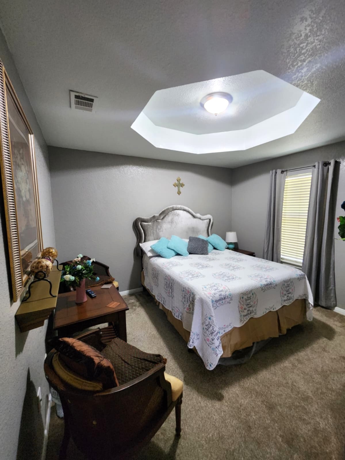 5603 Hunters Ridge Trail Killeen, TX 76542 - Photo 11 of 13 A comfortable bedroom with plush carpet and a stylish tray ceiling invites relaxation.