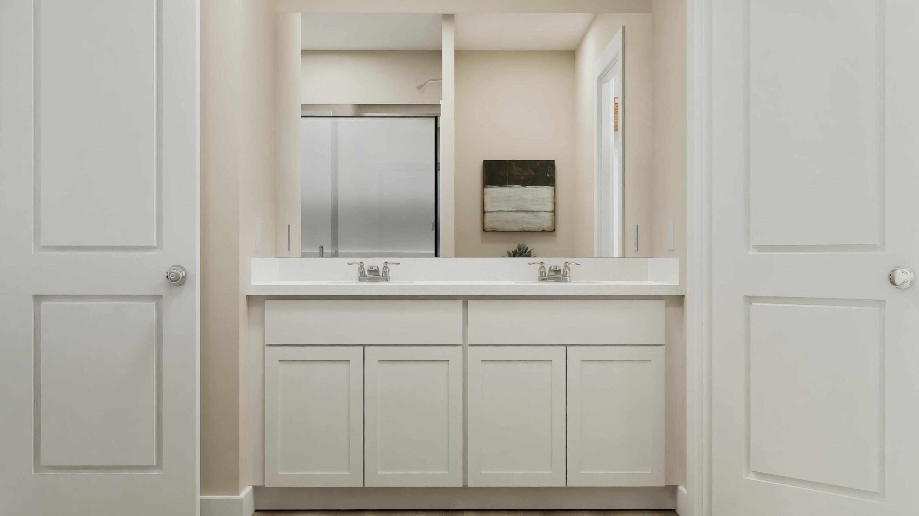 3784 Maple Street Portage, IN 46368 - Photo 19 of 21 a bathroom with a sink and a mirror