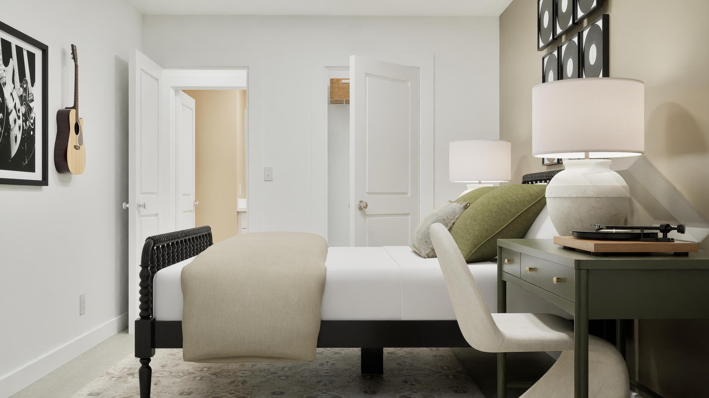 3784 Maple Street Portage, IN 46368 - Photo 5 of 21 a bedroom with a bed and a chair