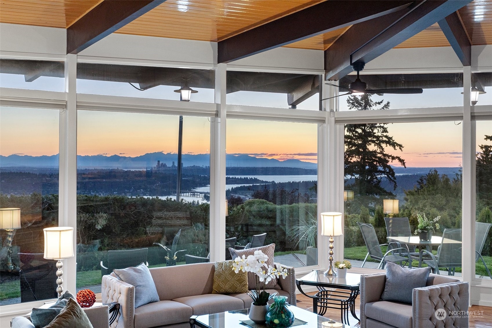 4428 140th Avenue Southeast Bellevue, WA 98006 - Photo 2 of 40 a view of a porch with couches and table