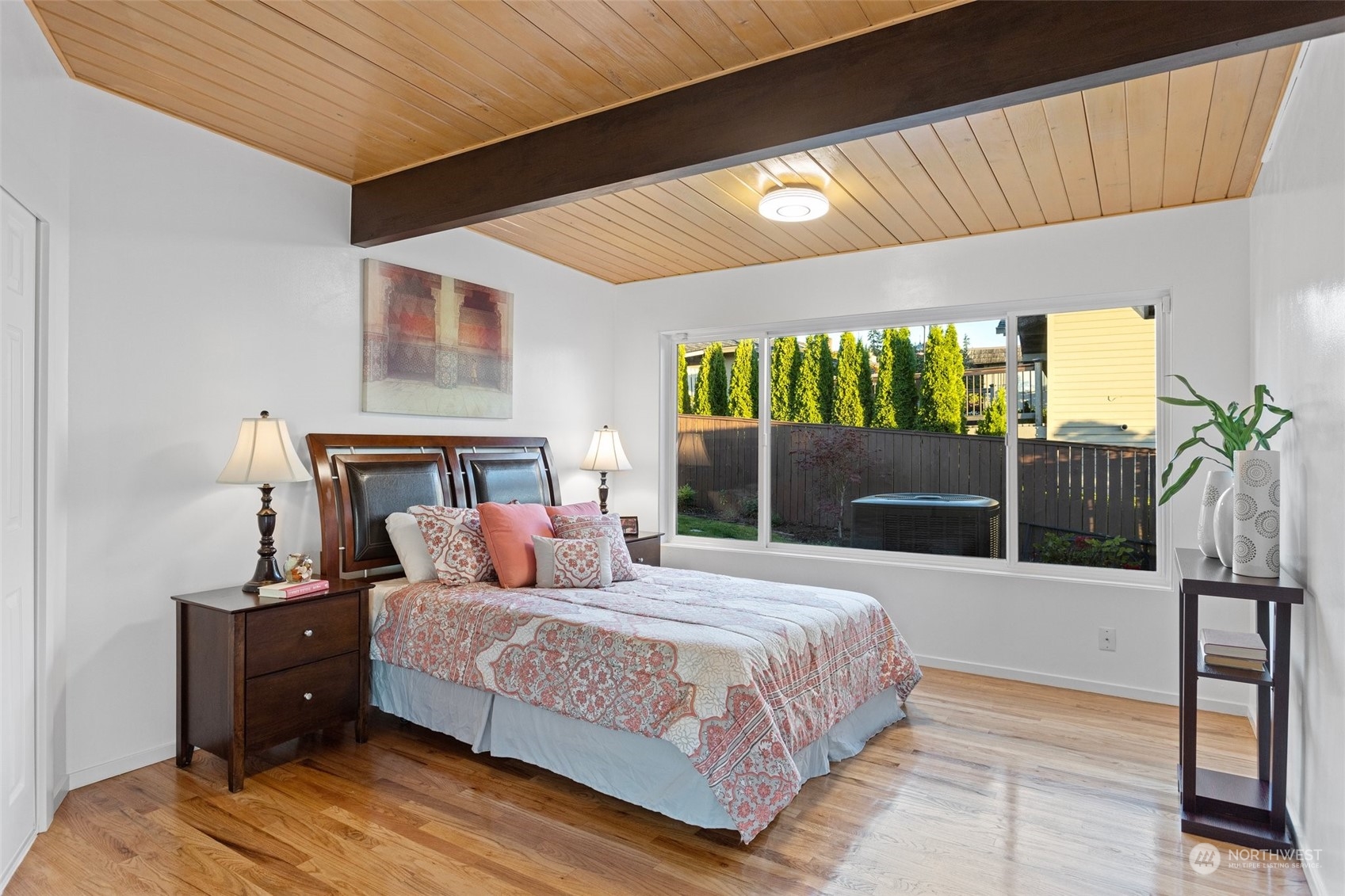 4428 140th Avenue Southeast Bellevue, WA 98006 - Photo 27 of 40 a bedroom with a bed and large window