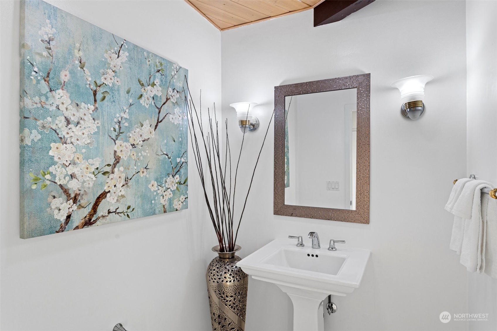 4428 140th Avenue Southeast Bellevue, WA 98006 - Photo 28 of 40 a bathroom with a sink and a mirror