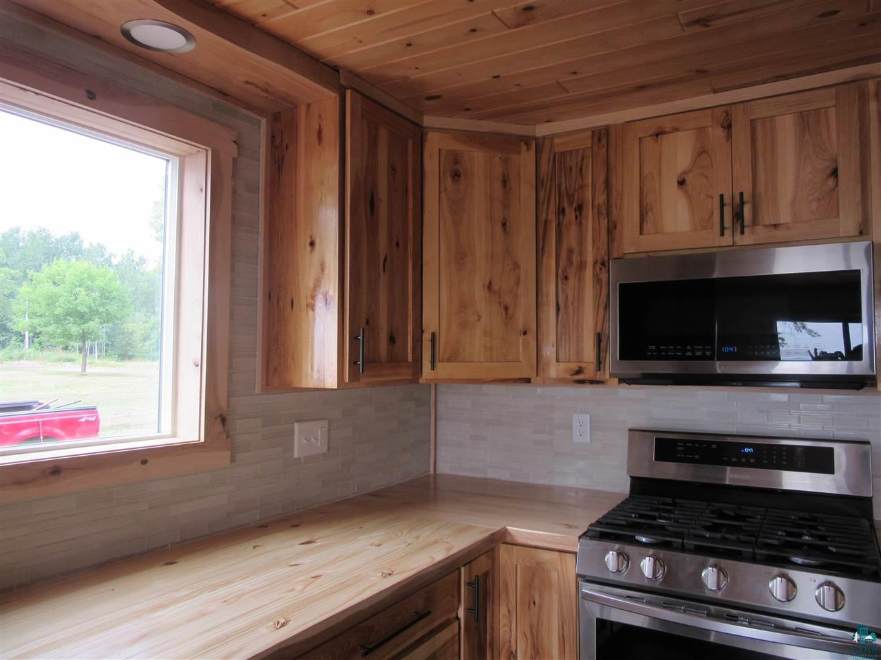 93790 Hyde Road Bayfield, WI 54814 - Photo 26 of 45 Designed with baking in mind, extra counter space and really functional cabinets