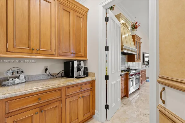 a front view of a house with outdoor seating