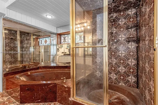 a room with a shower and a bath tub