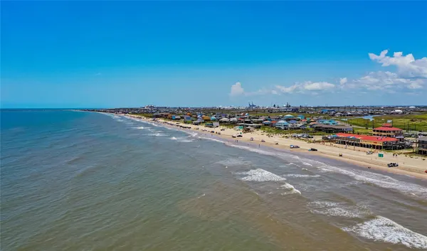 a view of an ocean and city