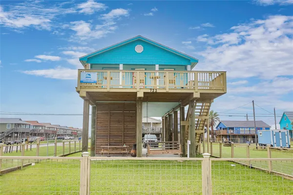 a front view of a house with swimming pool