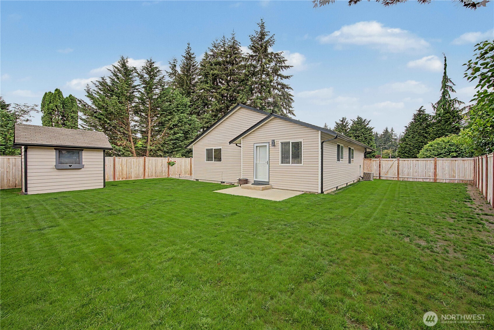 20919 Ronning Road Arlington, WA 98223 - Photo 21 of 28 a view of a backyard with plants and a garden