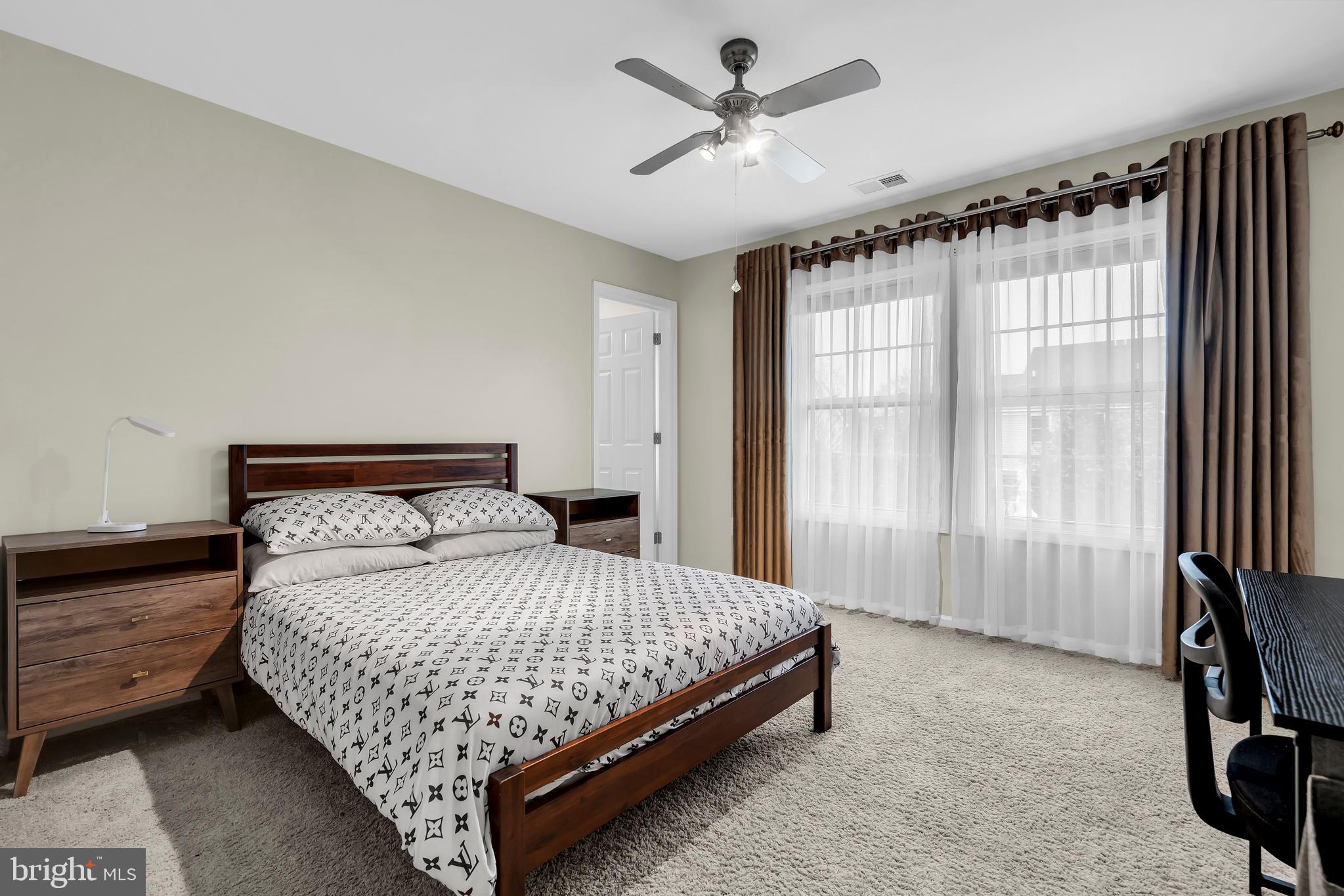 20 Jockey Place Chesterfield, NJ 08515 - Photo 35 of 49 a bedroom with a large bed and a window