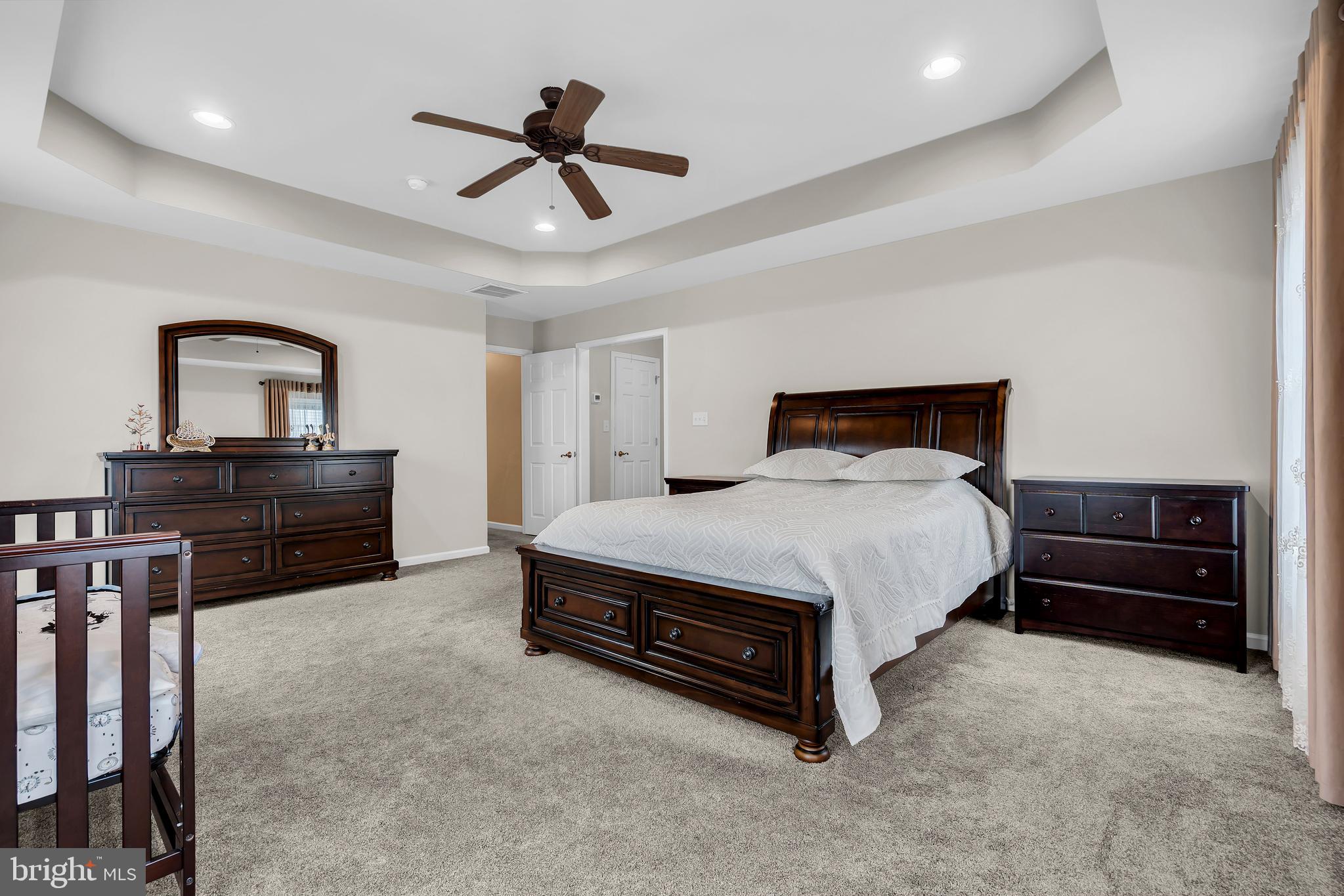 20 Jockey Place Chesterfield, NJ 08515 - Photo 38 of 49 a bedroom with a bed and a desk