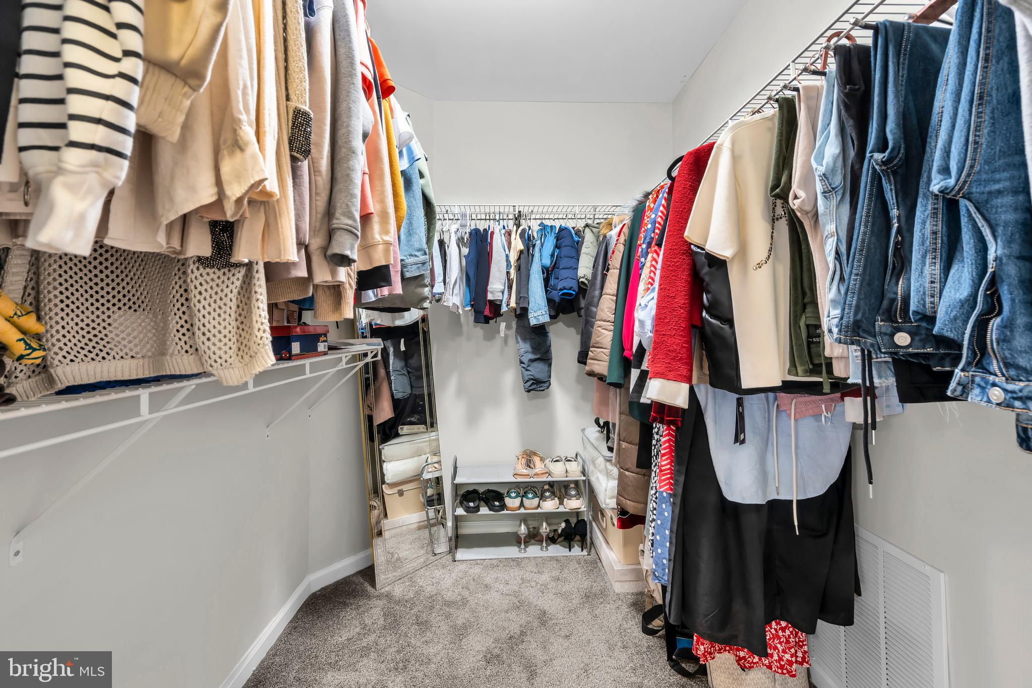 20 Jockey Place Chesterfield, NJ 08515 - Photo 40 of 49 a view of walk in closet with clothes and shoes