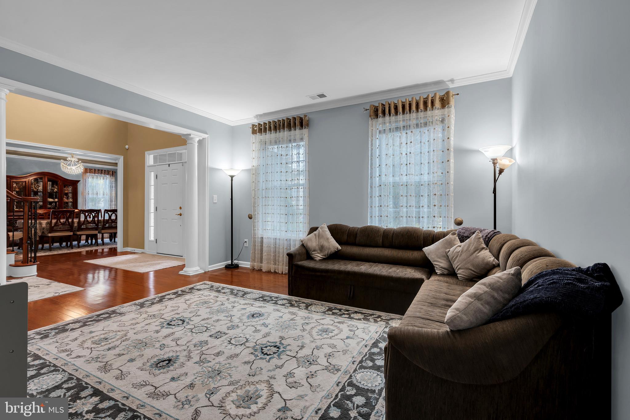 20 Jockey Place Chesterfield, NJ 08515 - Photo 7 of 49 a living room with furniture and a wooden floor