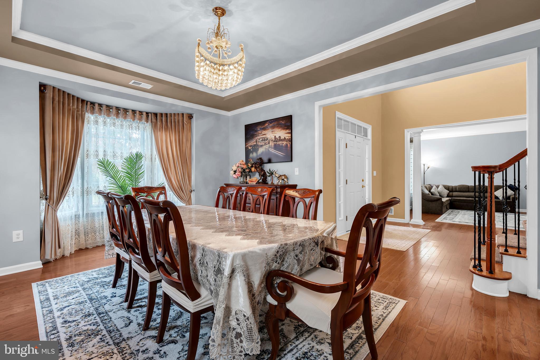 20 Jockey Place Chesterfield, NJ 08515 - Photo 8 of 49 a view of a dining room with furniture window and wooden floor