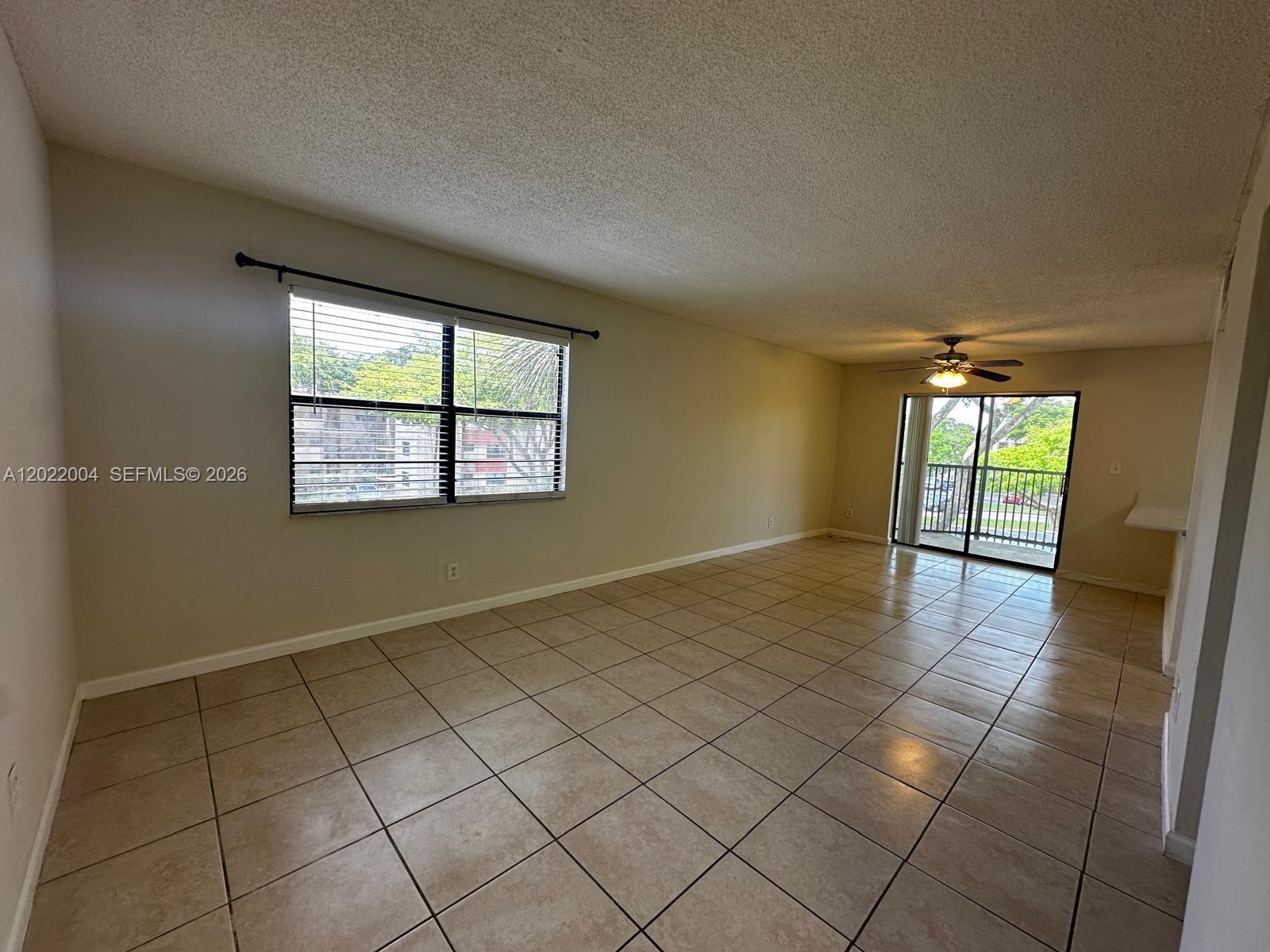 3400 Foxcroft Road, Unit 301 Miramar, FL 33025 - Photo 55 of 72 an empty room with windows and closet