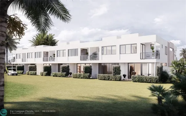 a view of a house with a swimming pool and a yard