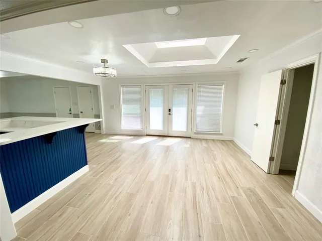 a view of kitchen with wooden floor