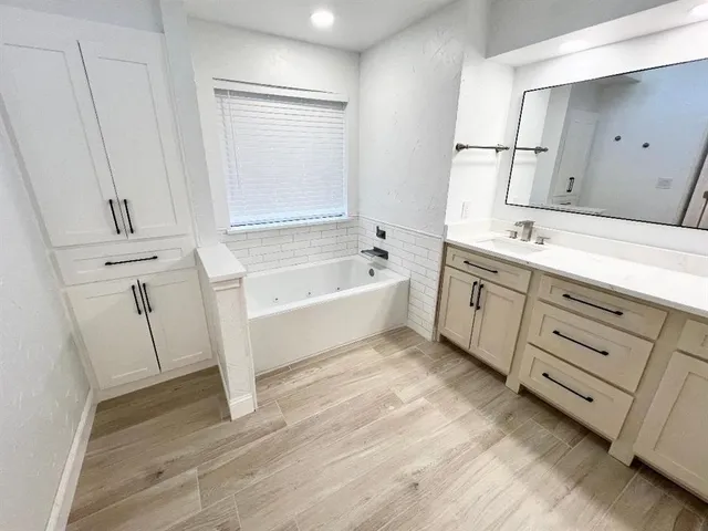 a bathroom with a bathtub
