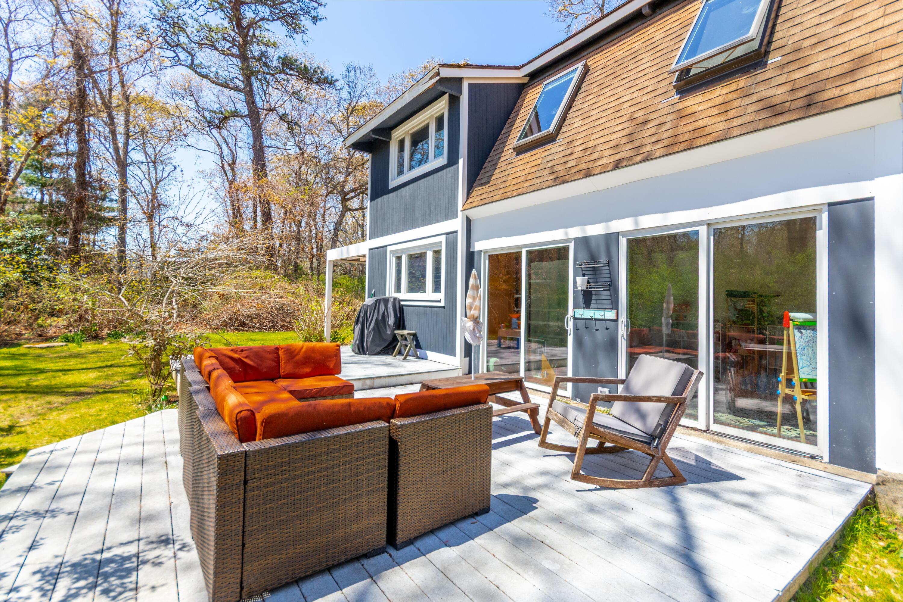 149 Wheeler Road Mashpee, MA 02649 - Photo 3 of 41 Back deck for summer relaxing