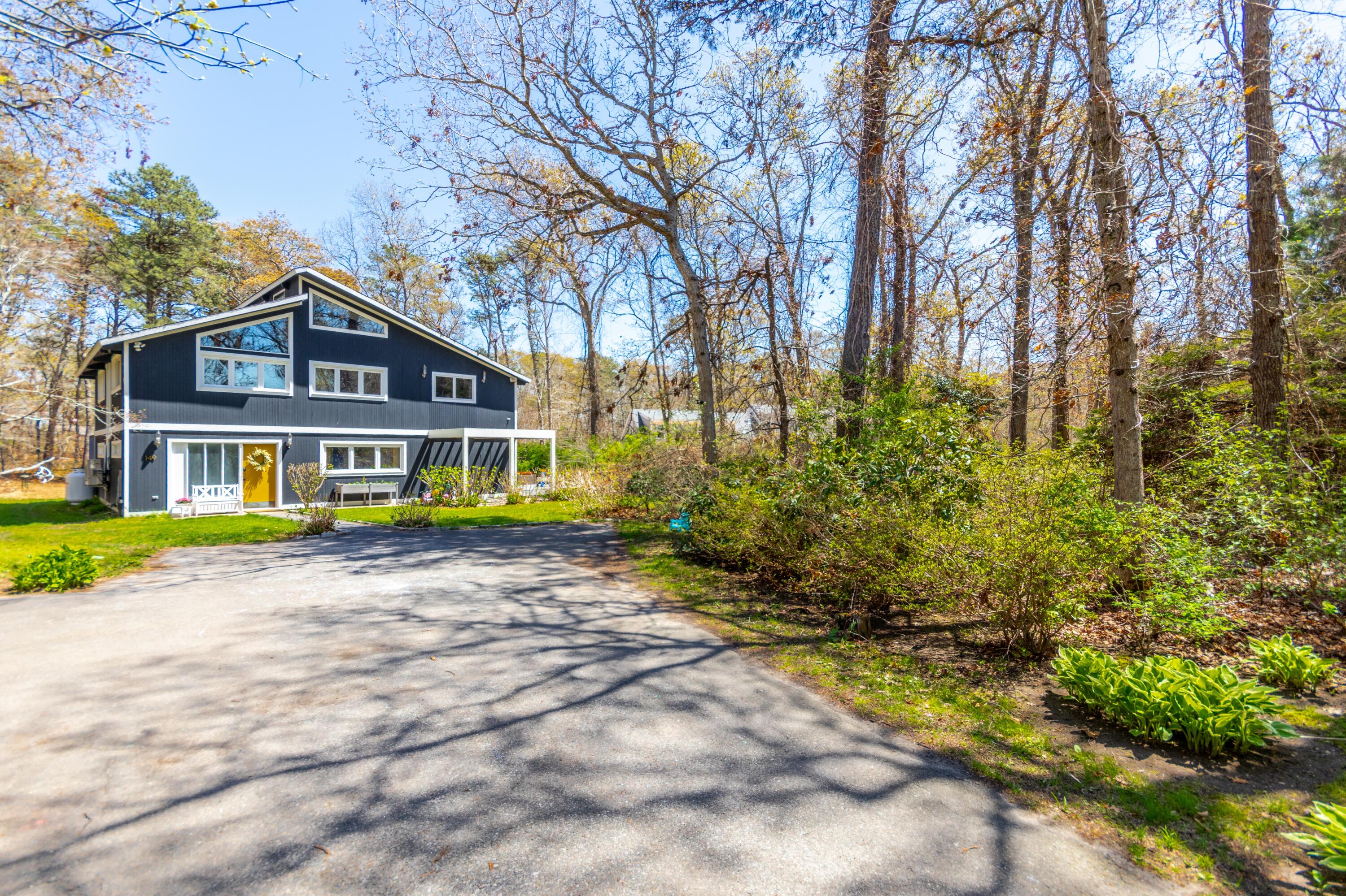 149 Wheeler Road Mashpee, MA 02649 - Photo 32 of 41 Distant front with large driveway