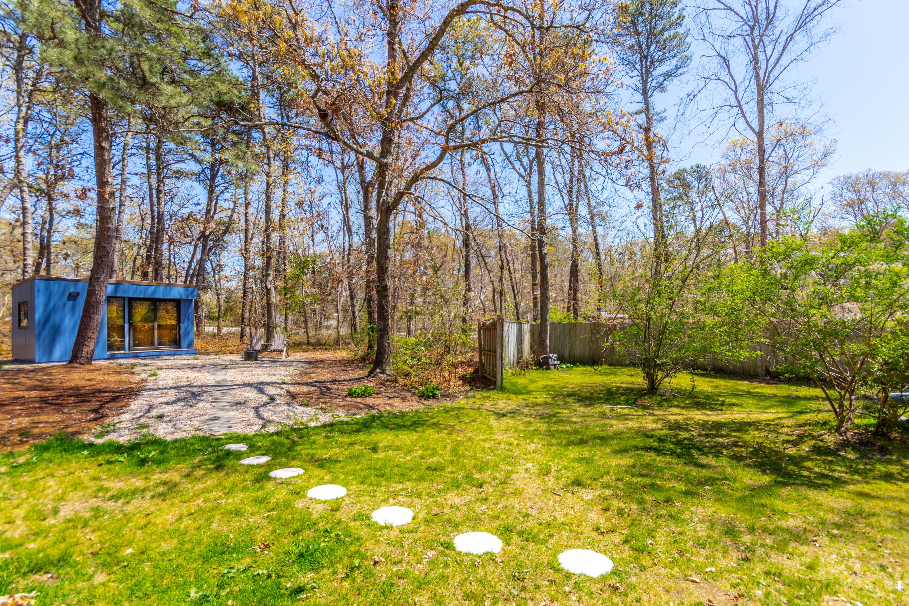149 Wheeler Road Mashpee, MA 02649 - Photo 37 of 41 Back yard with outbuilding