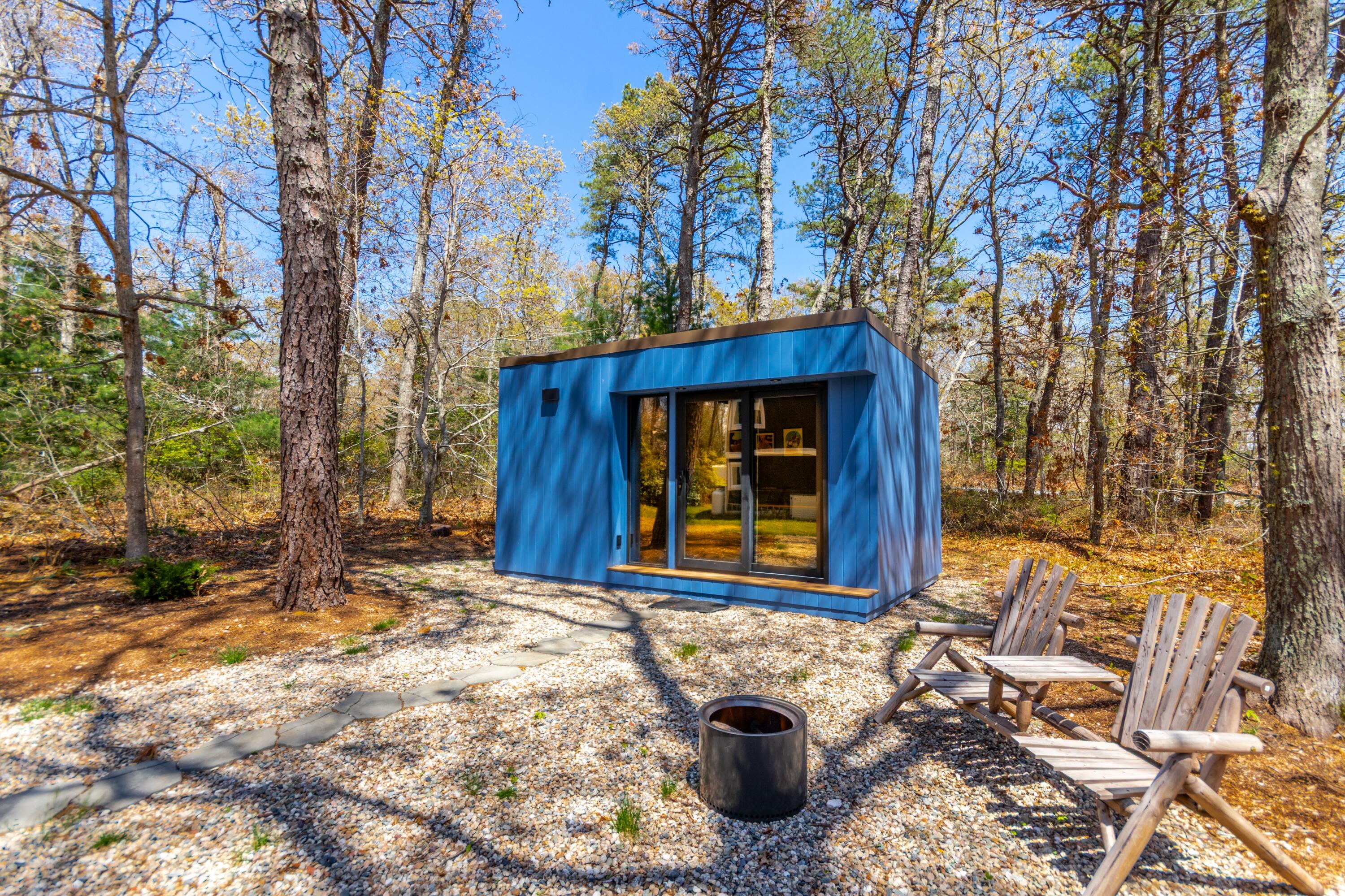 149 Wheeler Road Mashpee, MA 02649 - Photo 38 of 41 Firepit area and outbuilding