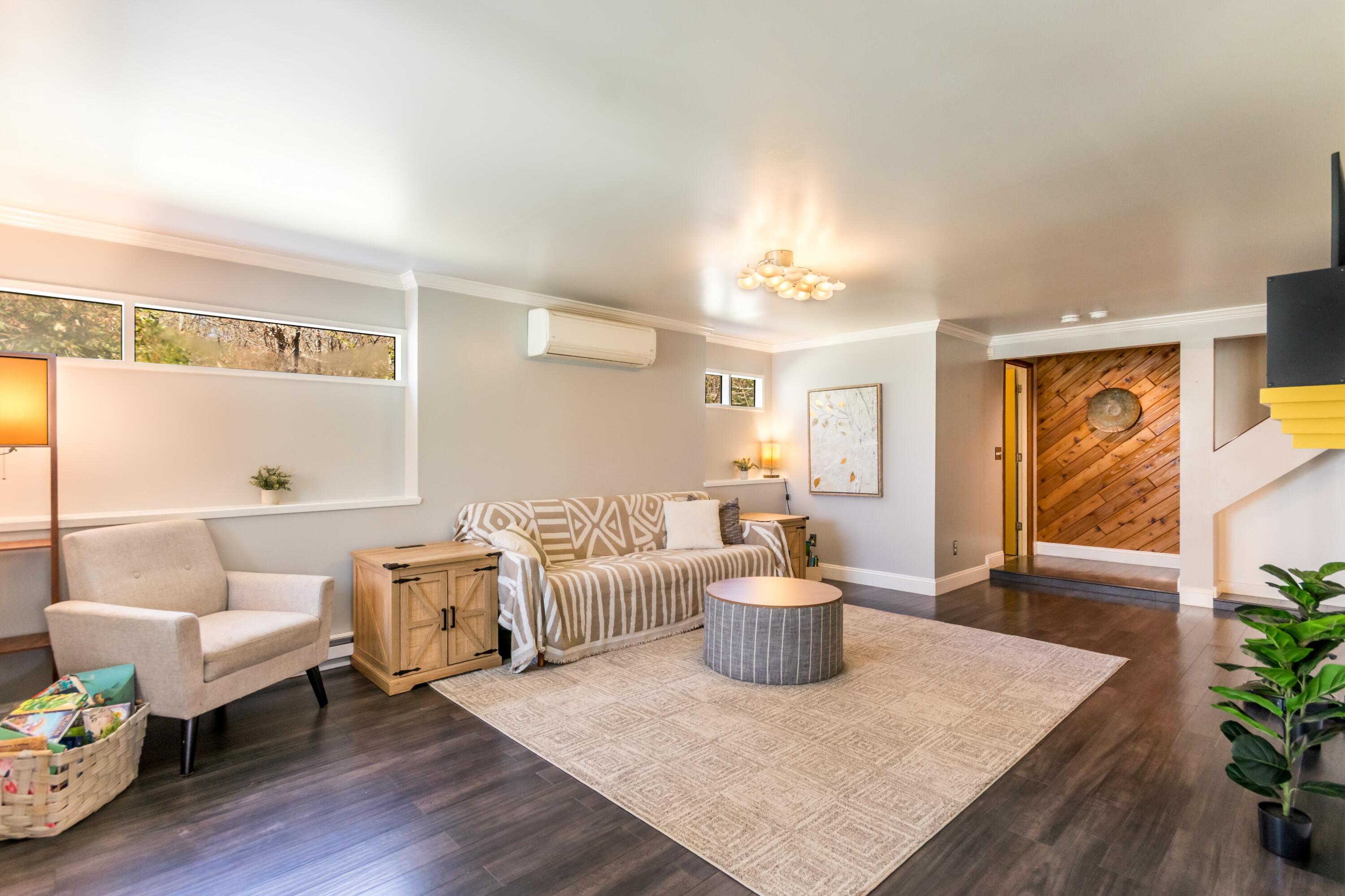 149 Wheeler Road Mashpee, MA 02649 - Photo 6 of 41 a living room with furniture and wooden floor