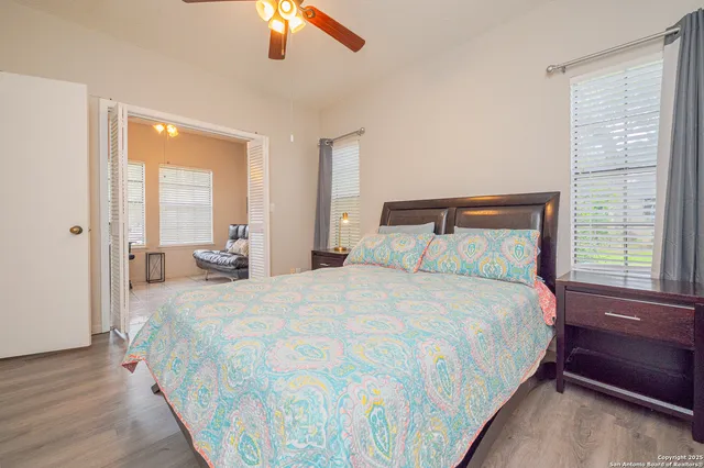 a bedroom with bed and window