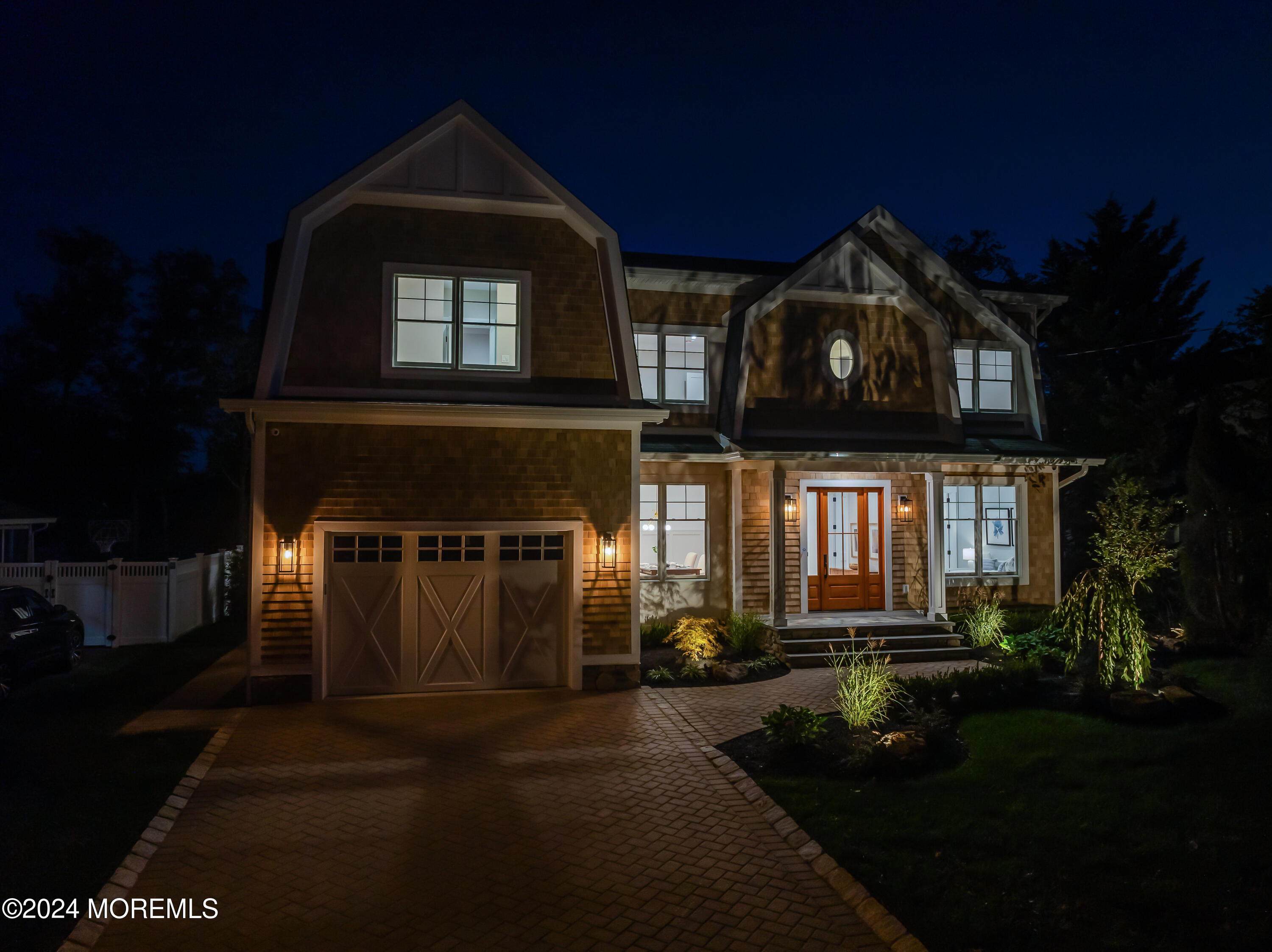 557 Ocean Road Spring Lake Heights, NJ 07762 - Photo 2 of 62 a front view of a house with a yard