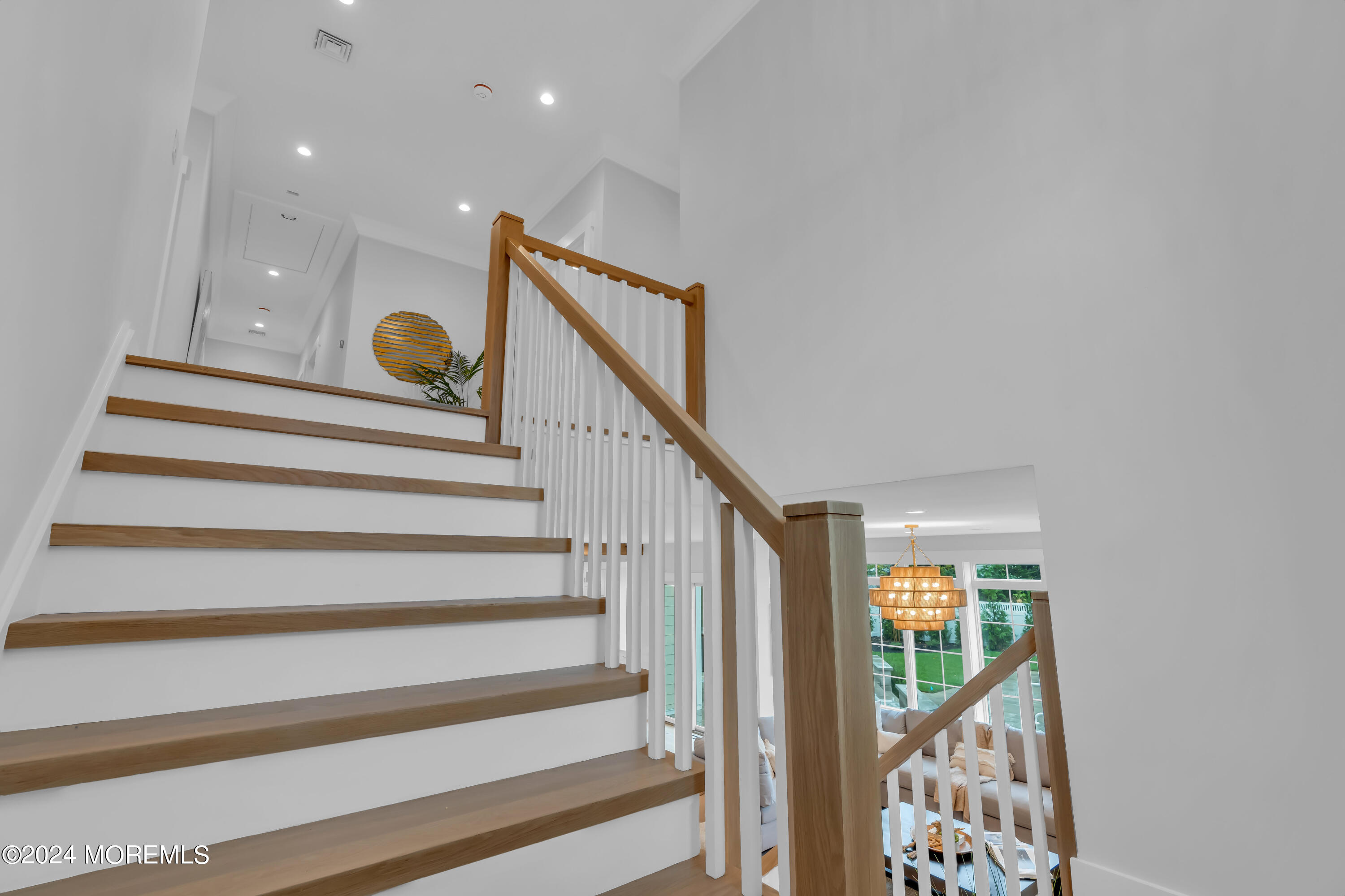 557 Ocean Road Spring Lake Heights, NJ 07762 - Photo 30 of 62 a view of entryway kitchen and hall with wooden floor