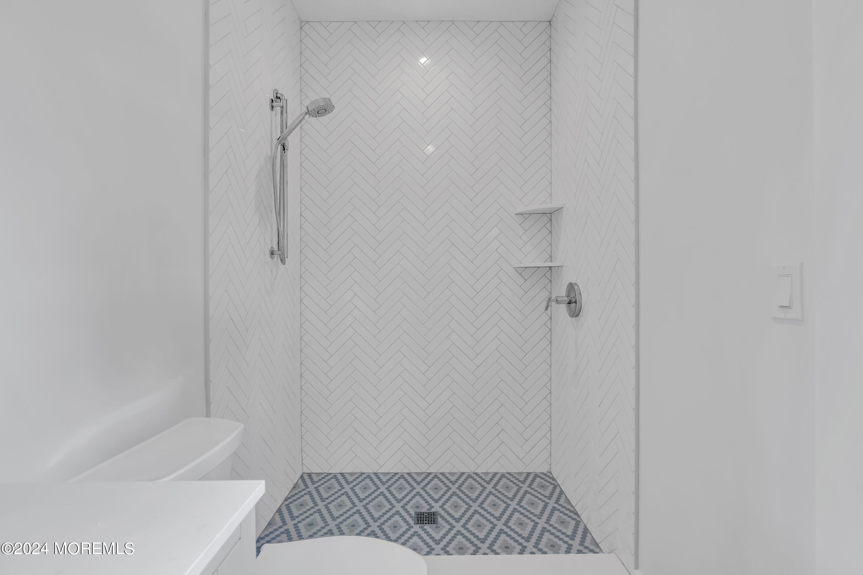 557 Ocean Road Spring Lake Heights, NJ 07762 - Photo 59 of 62 a bathroom with a sink and a shower