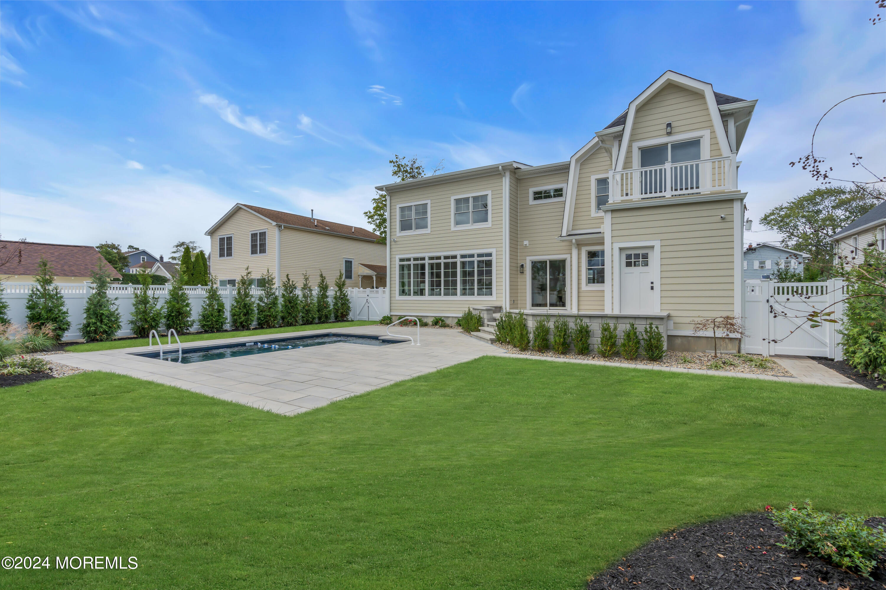 557 Ocean Road Spring Lake Heights, NJ 07762 - Photo 60 of 62 a front view of a house with a yard