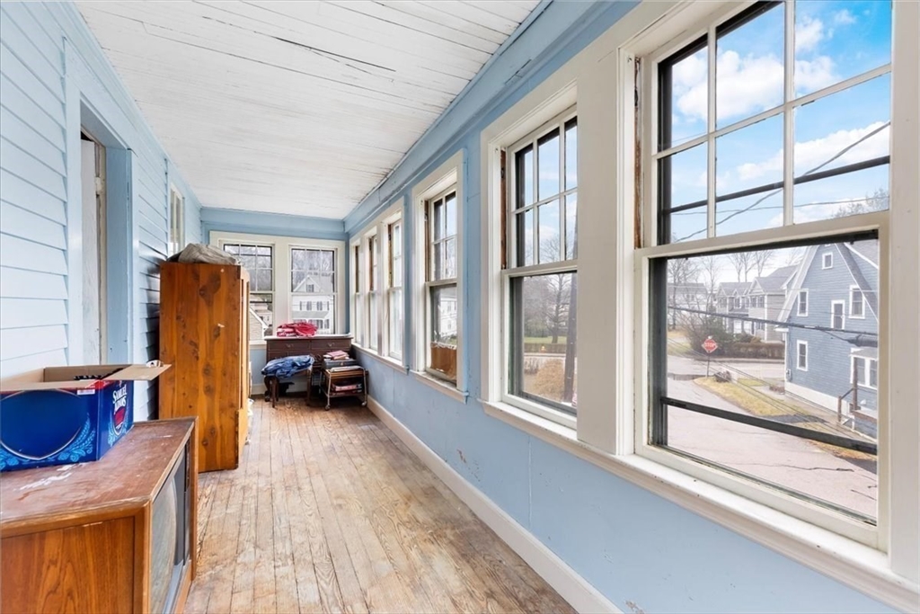 7 Liberty Street Mansfield, MA 02048 - Photo 11 of 42 a bedroom with furniture and a large window