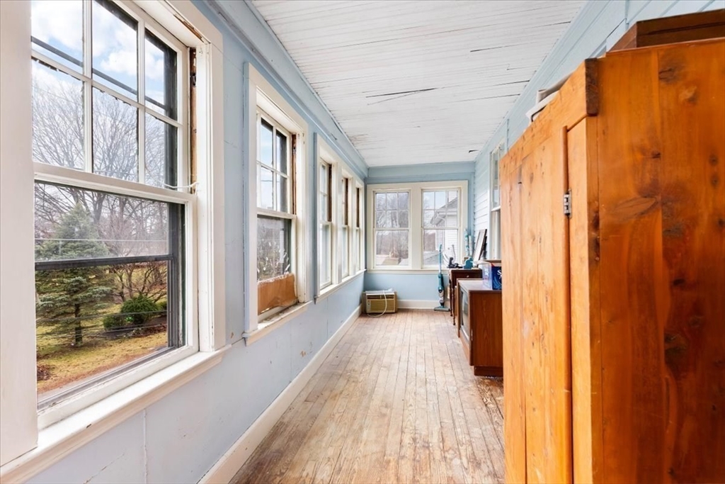 7 Liberty Street Mansfield, MA 02048 - Photo 12 of 42 a view of a living room with a large window and furniture