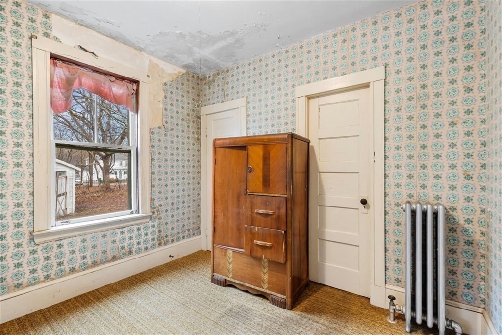 7 Liberty Street Mansfield, MA 02048 - Photo 20 of 42 a view of an entryway with wooden floor
