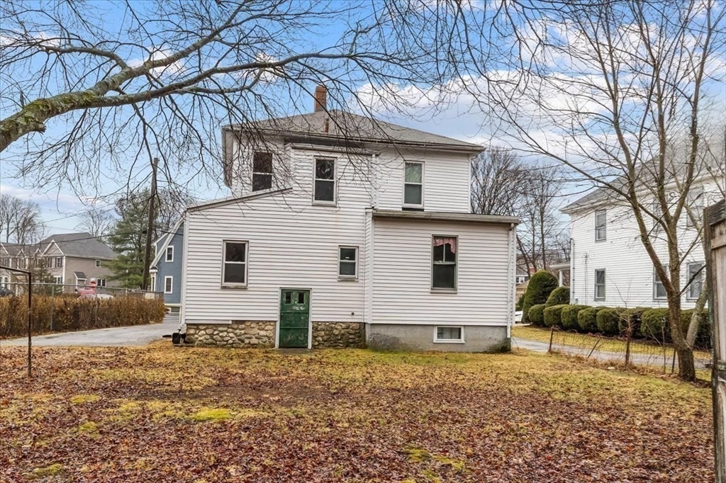 7 Liberty Street Mansfield, MA 02048 - Photo 8 of 42 a view of a house with a yard