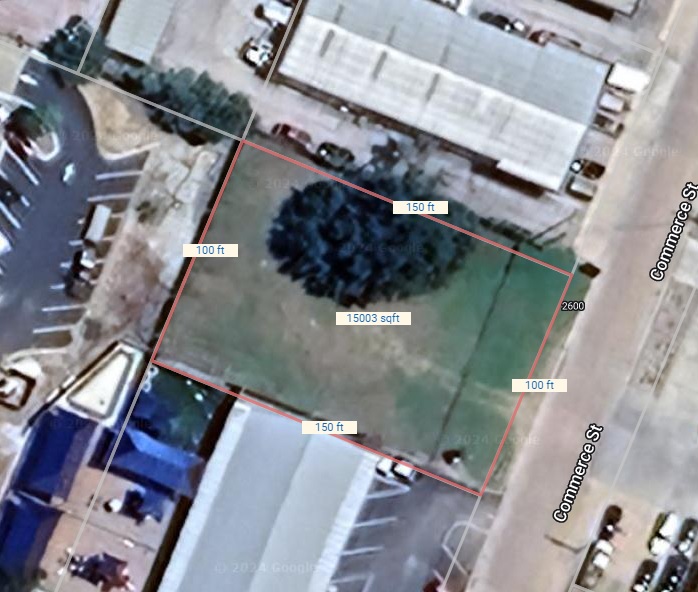 2600 Commerce Street Marble Falls, TX 78654 - Photo 11 of 12 an aerial view of a house with a yard