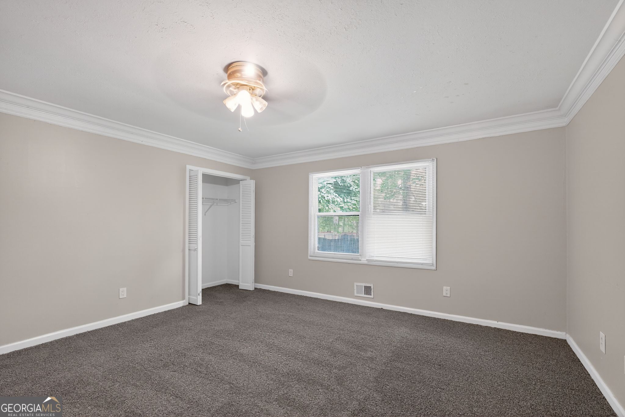 3285 Old Salem Road Southeast Conyers, GA 30013 - Photo 25 of 33 an empty room with a window