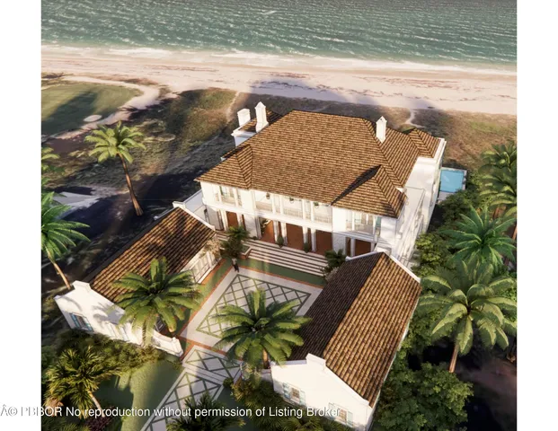 a view of a swimming pool with sitting area