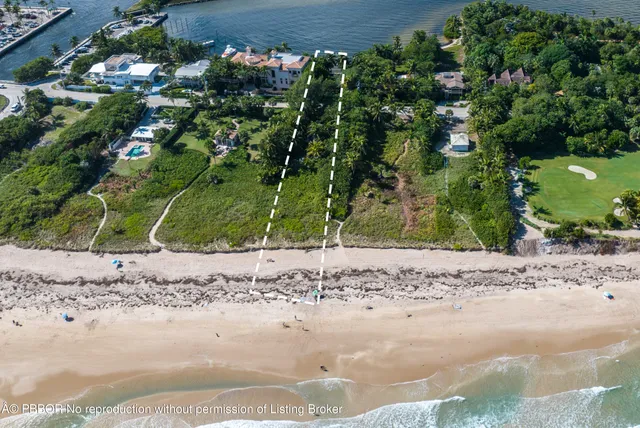 an aerial view of a house yard swimming pool and outdoor seating
