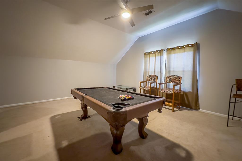 29400 Waller Gladish Road Waller, TX 77484 - Photo 32 of 39 a room with gym equipment