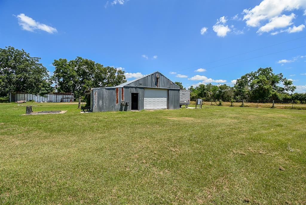 29400 Waller Gladish Road Waller, TX 77484 - Photo 37 of 39 a view of a house with a yard