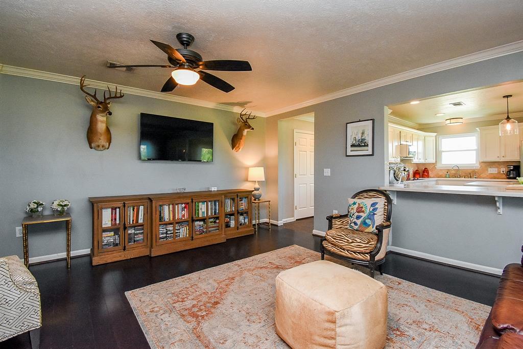29400 Waller Gladish Road Waller, TX 77484 - Photo 7 of 39 a living room with furniture and a flat screen tv