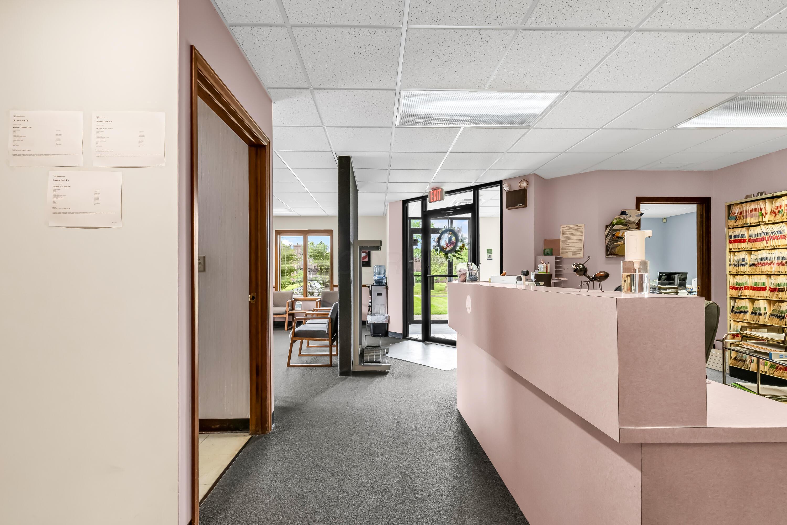 1240 Crescent Heights Road Marion, OH 43302 - Photo 7 of 60 • Blue carpet • Ivory painted walls • Acoustic ceiling tiles