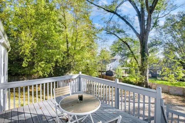a view of balcony with furniture