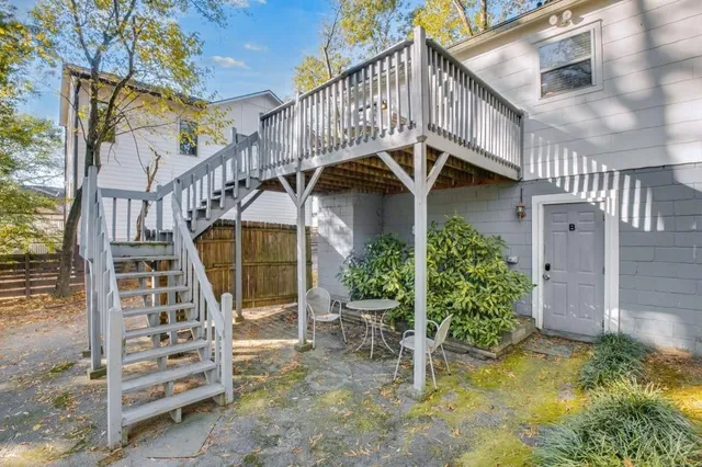 a view of a house with wooden stairs