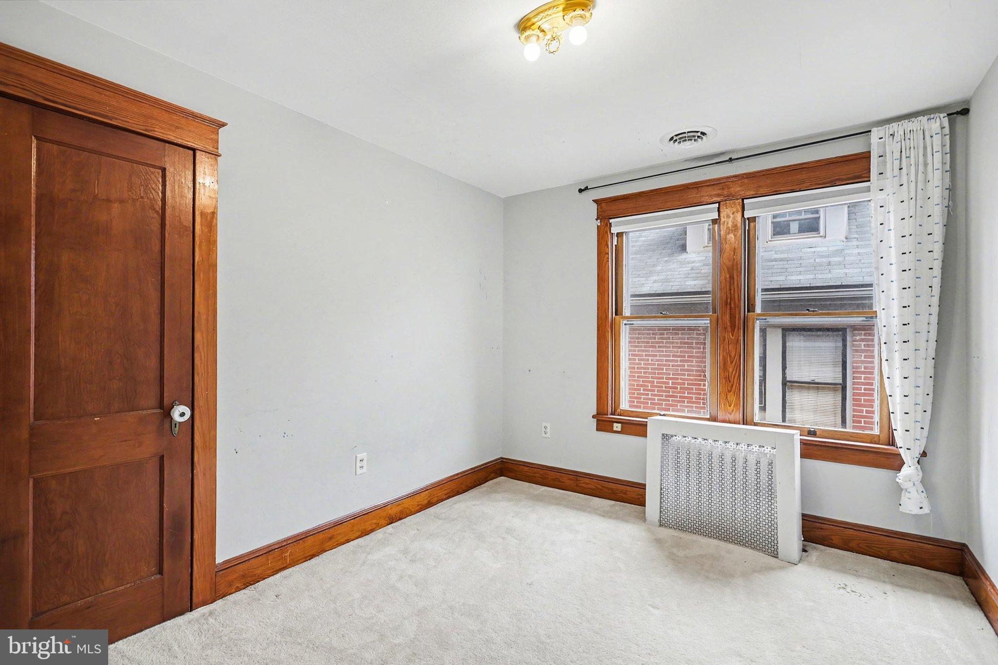 144 Seminary Avenue Gettysburg, PA 17325 - Photo 14 of 28 an empty room with windows