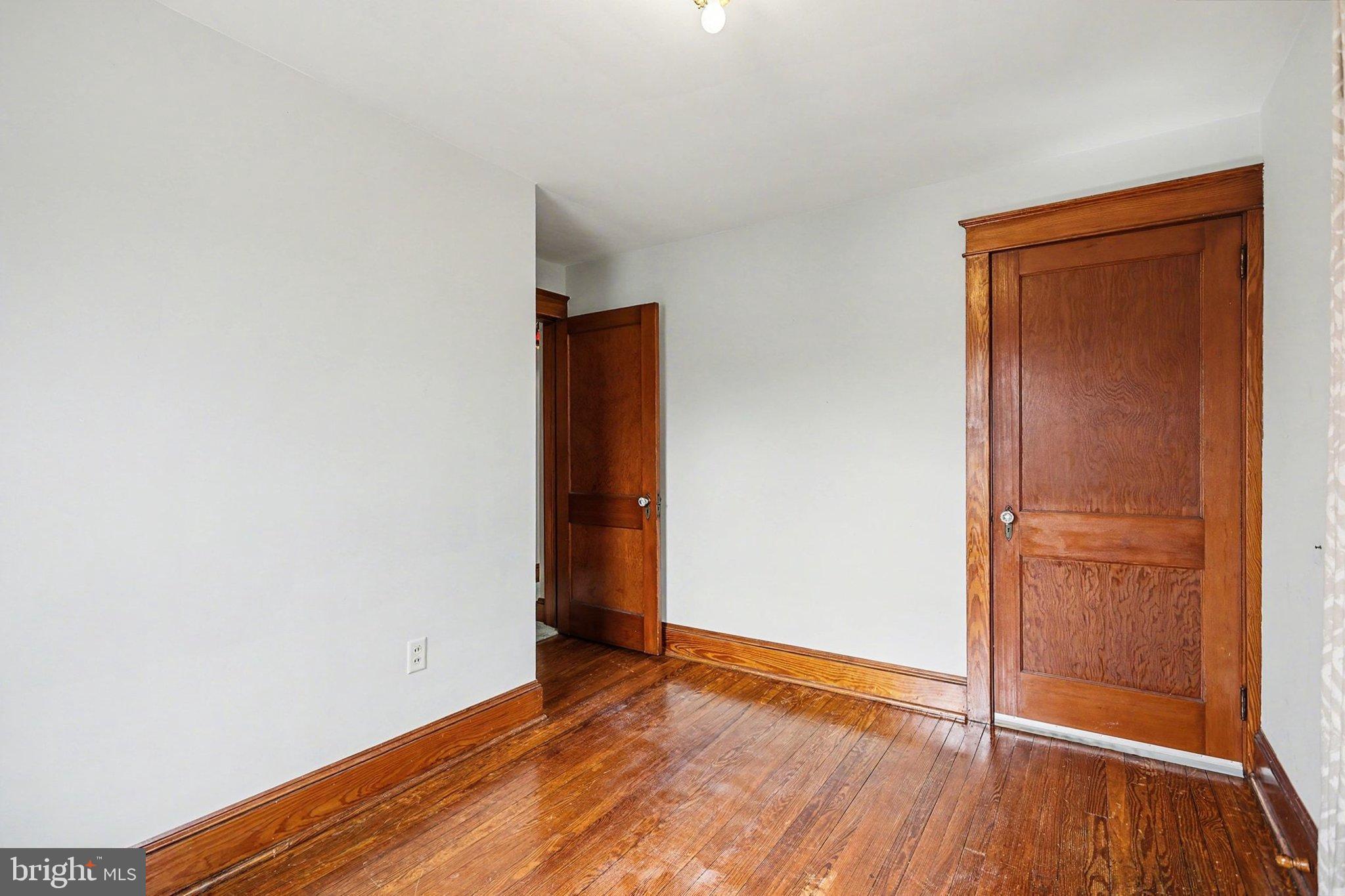 144 Seminary Avenue Gettysburg, PA 17325 - Photo 16 of 28 wooden floor in an empty room