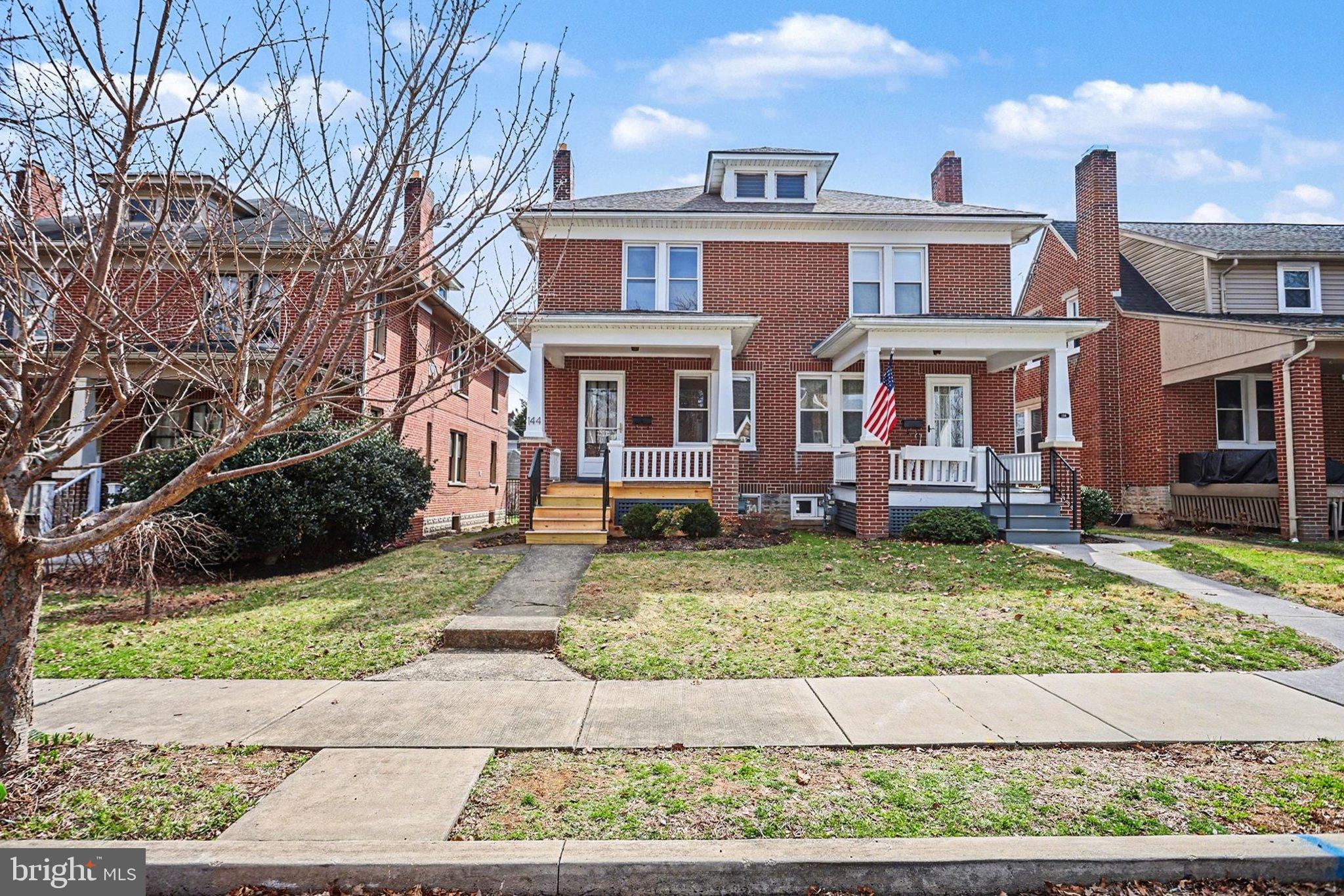 144 Seminary Avenue Gettysburg, PA 17325 - Photo 2 of 28 a front view of a house with a yard