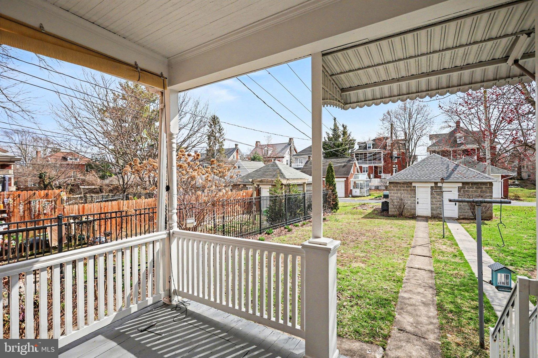144 Seminary Avenue Gettysburg, PA 17325 - Photo 22 of 28 a porch with a yard