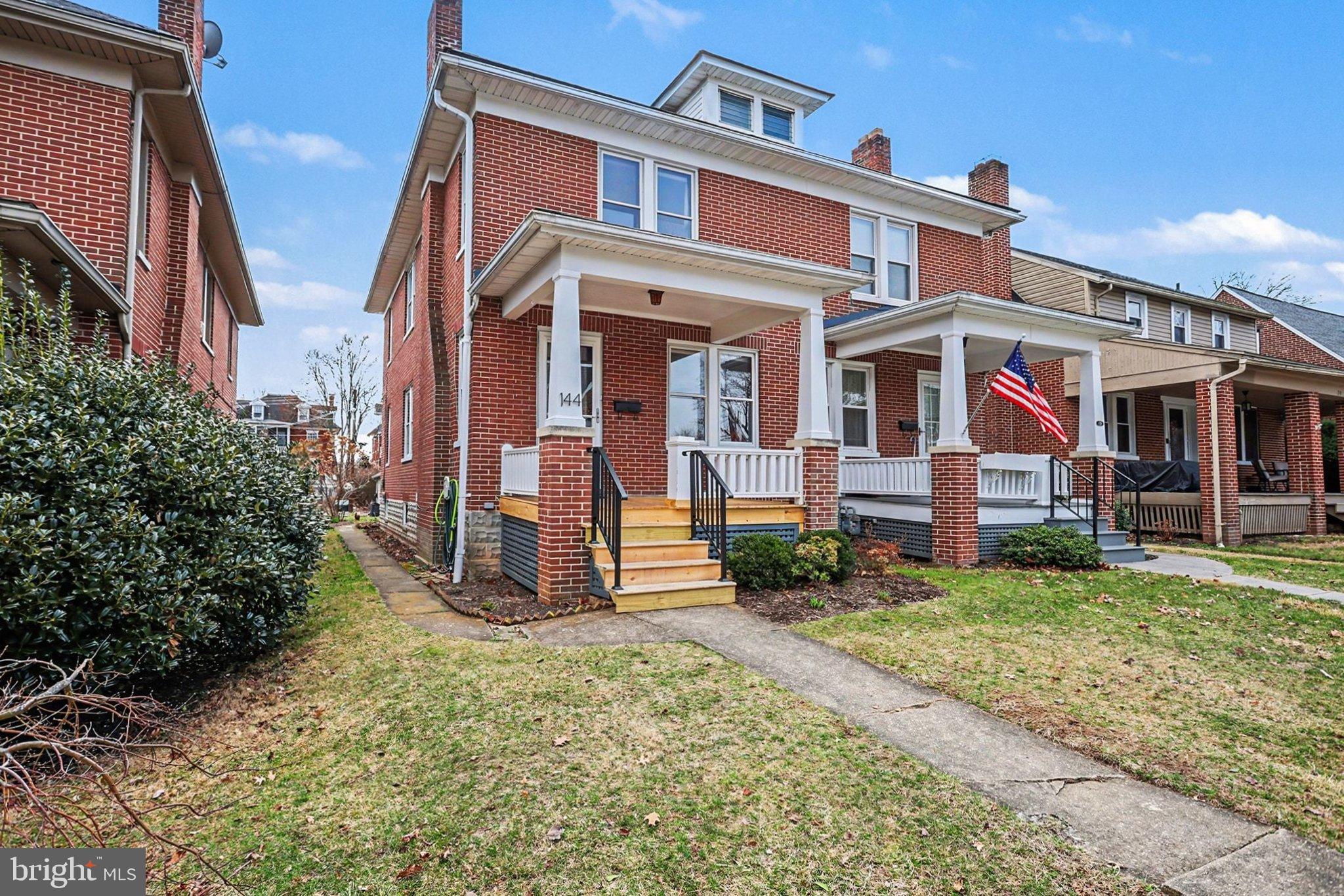 144 Seminary Avenue Gettysburg, PA 17325 - Photo 4 of 28 front view of a house with a yard